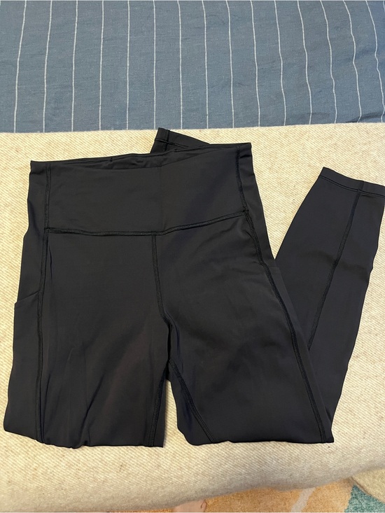 Athleta Pants - Athleta Black High-Rise Ultimate Stash Pocket 7/8 Performance Leggings